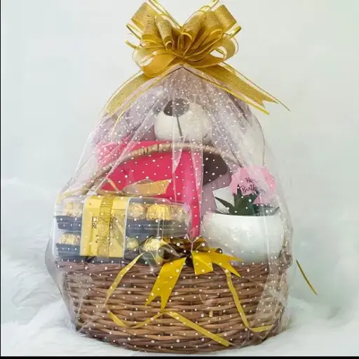 hamper filled with teddy bear and chocolates